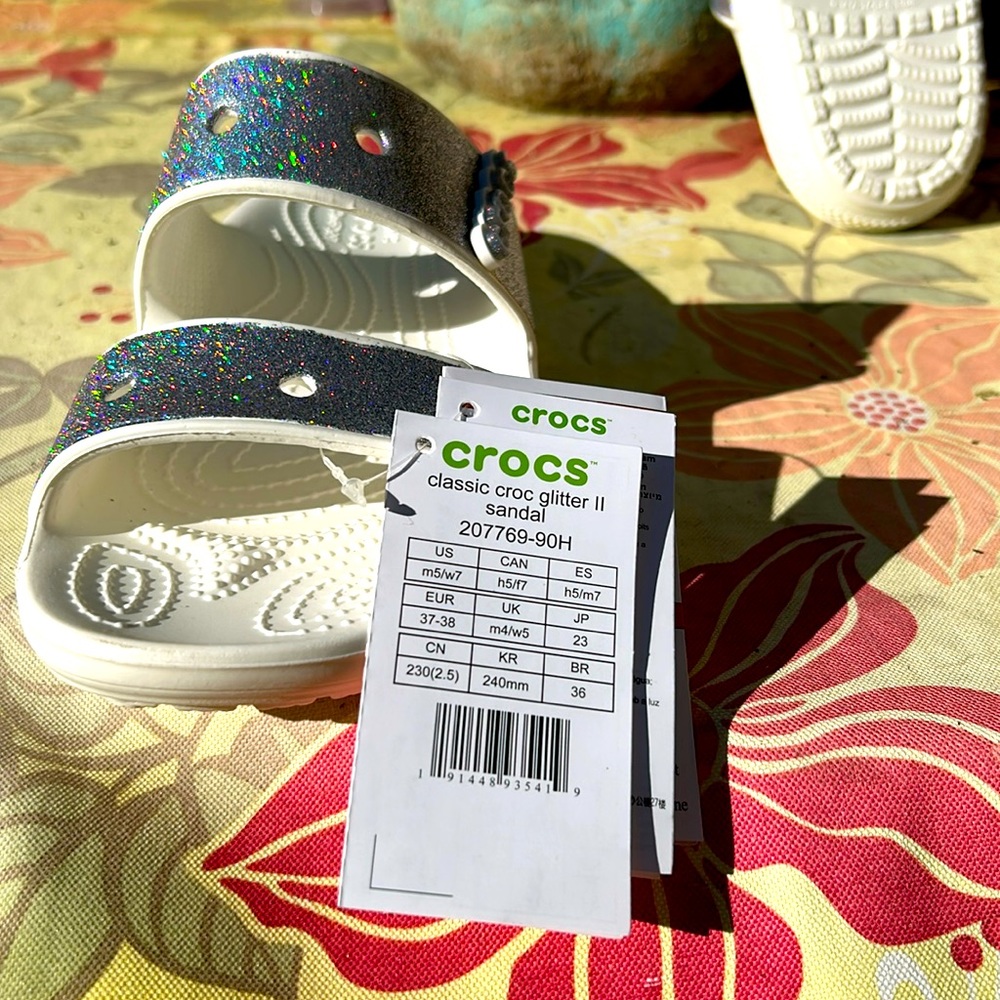 Crocs, classic glitter sandal.